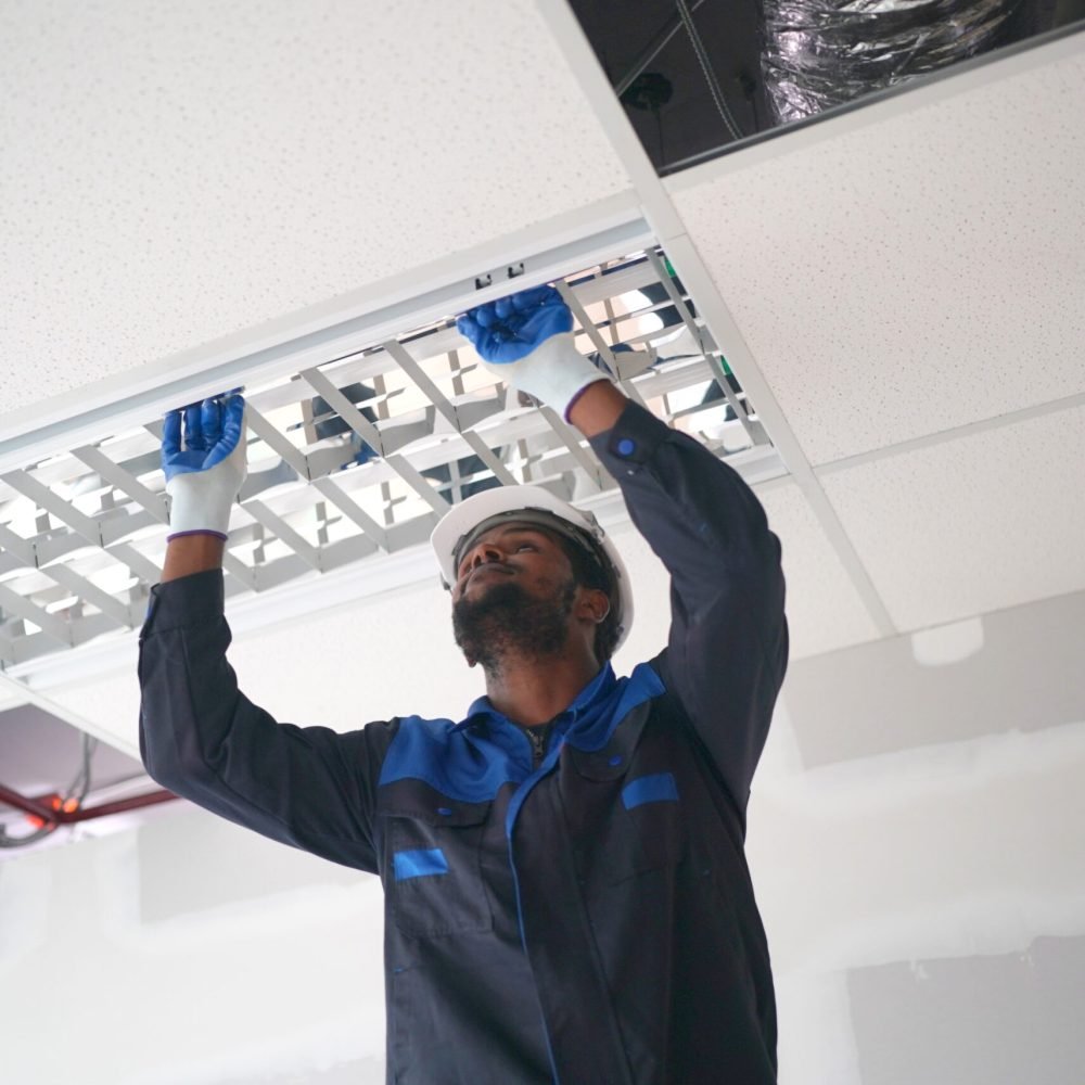 Architect and construction engineer or surveyor discussion plans and blueprints