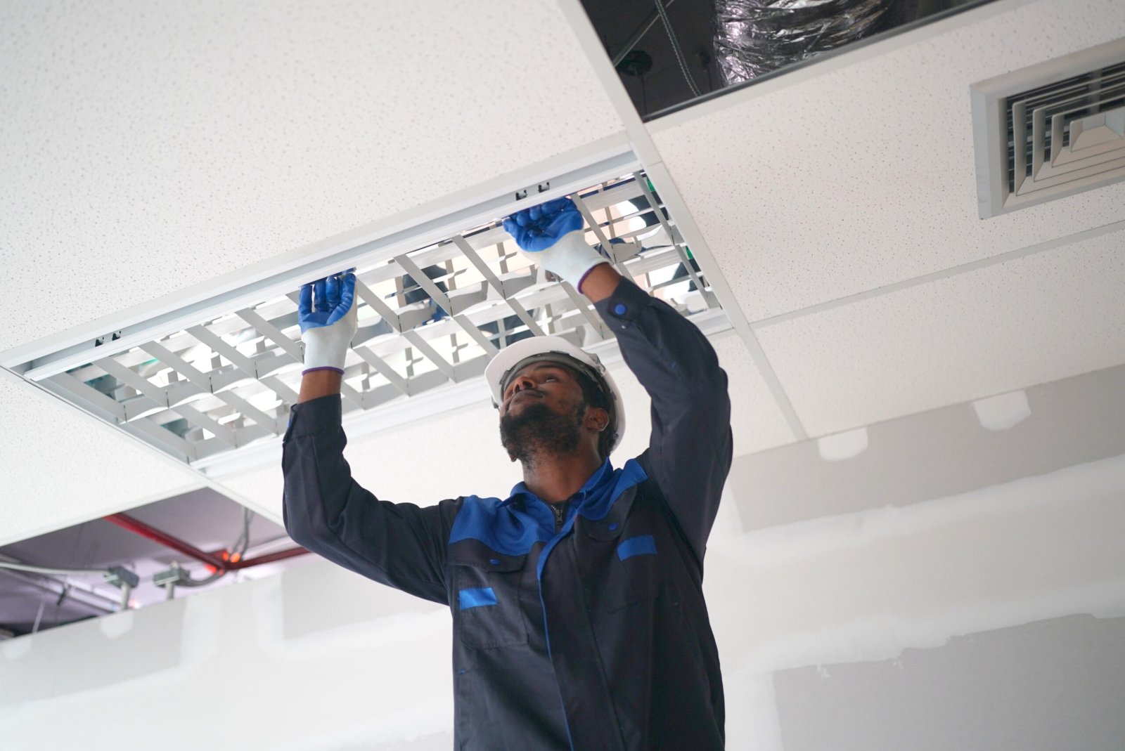 Architect and construction engineer or surveyor discussion plans and blueprints